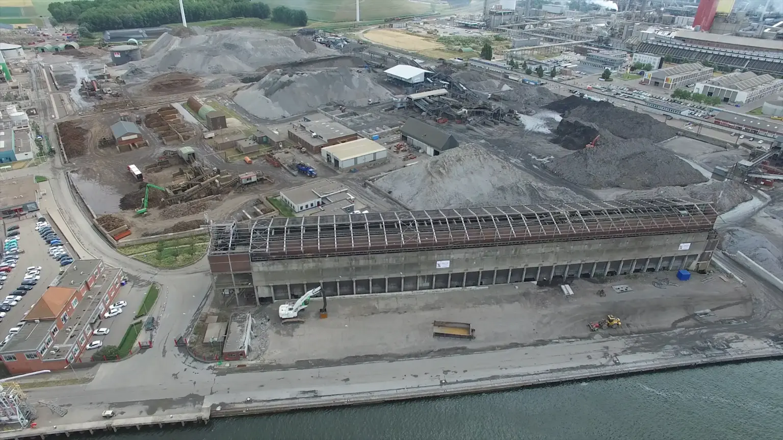 Industrial landscape with buildings and recycling plants.