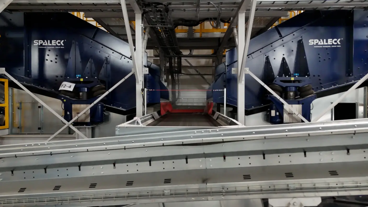 Two SPALECK Vibrating screens in a recycling plant for LDPE material. The two screening machines classify the material according to size for the downstream NIR sorting technology.