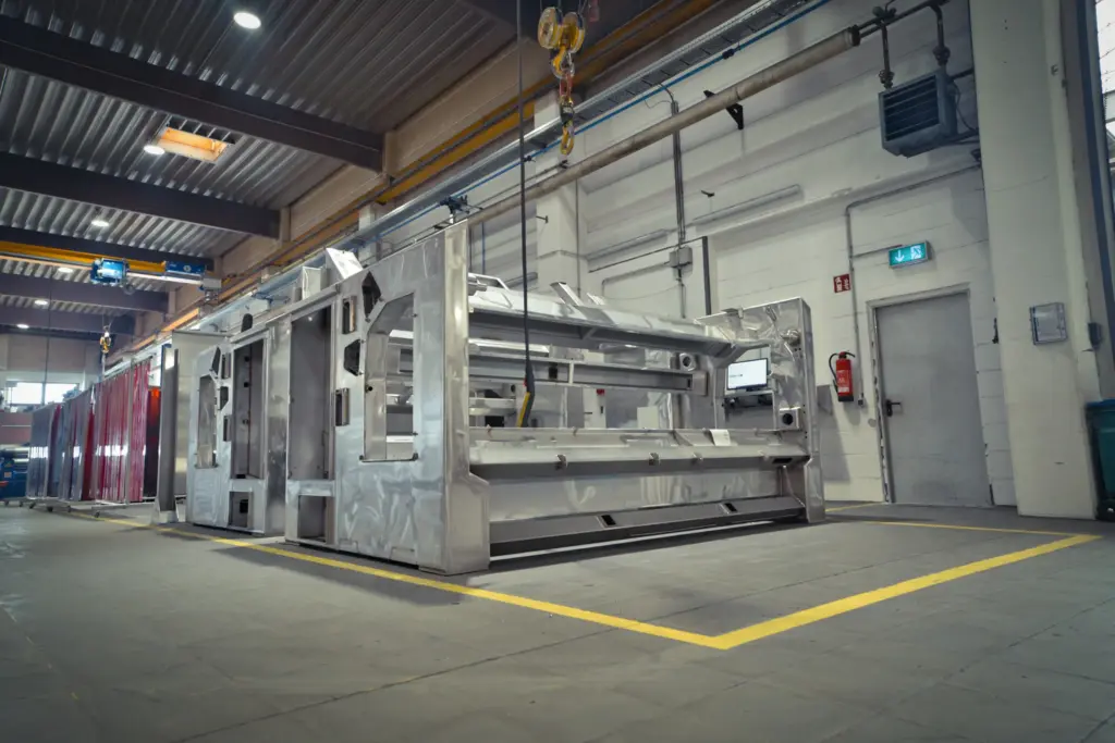Large welded assembly in SPALECK's production facility. Welded assemblies, including machining and assembly, are components of very large food production facilities. Here they are still in production at the contract manufacturer SPALECK.