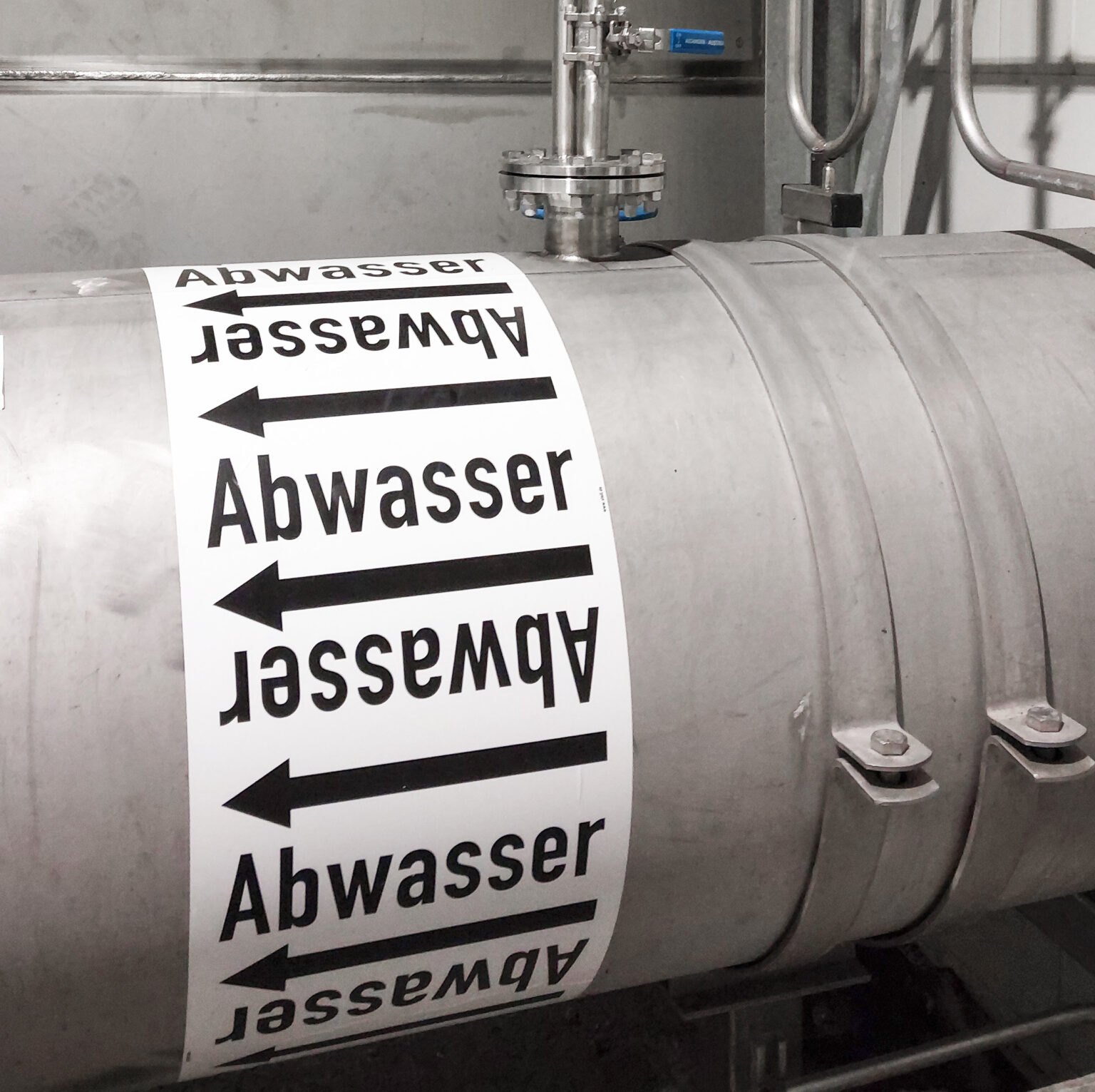 Gray pipe labeled "Wastewater"