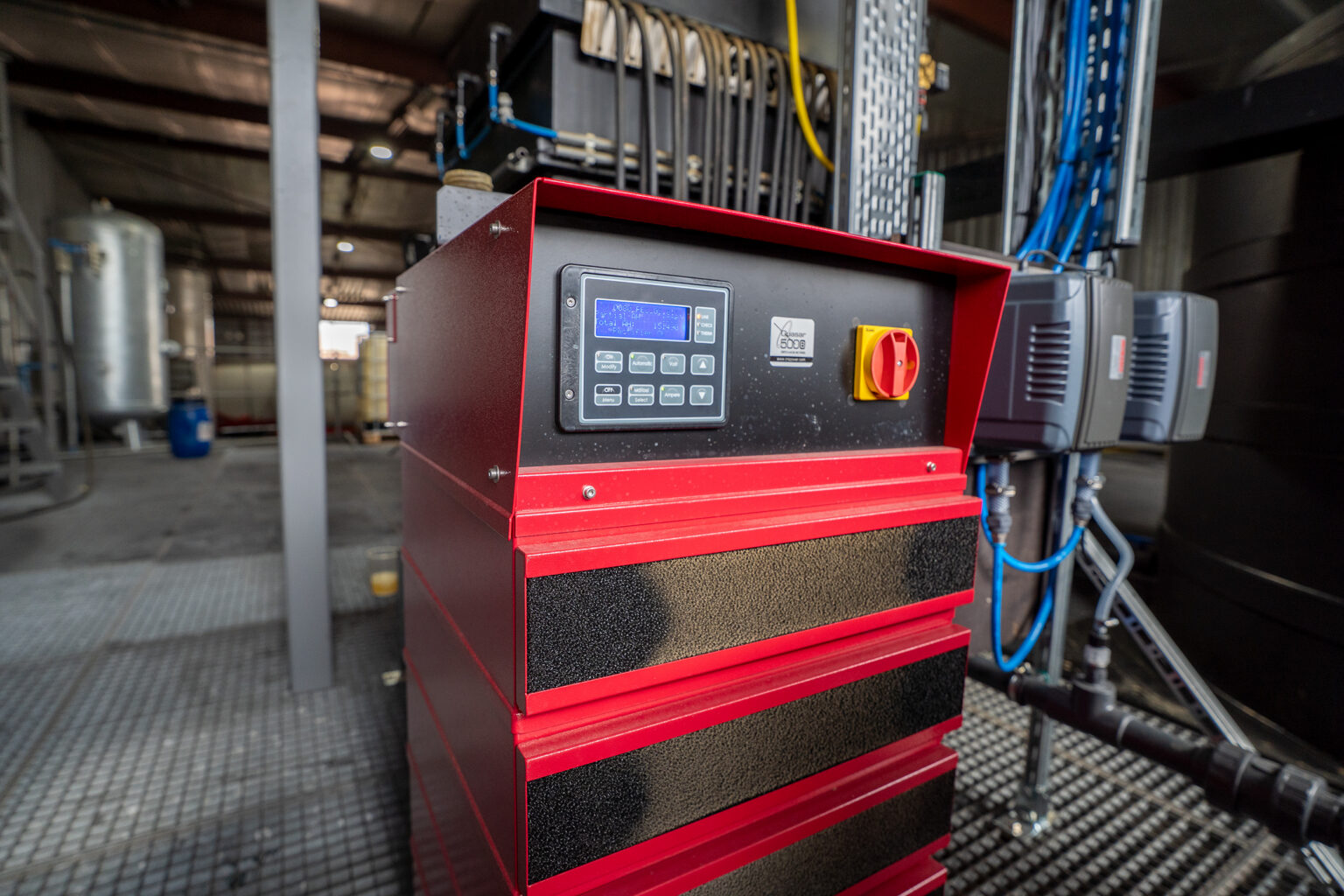 Close-up of a Morselt RedBox electrocoagulation system in operation.