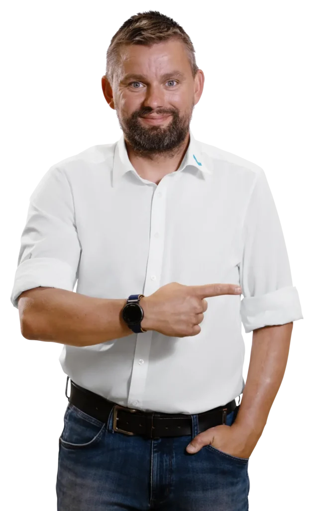 A man in a white shirt is pointing to the side.